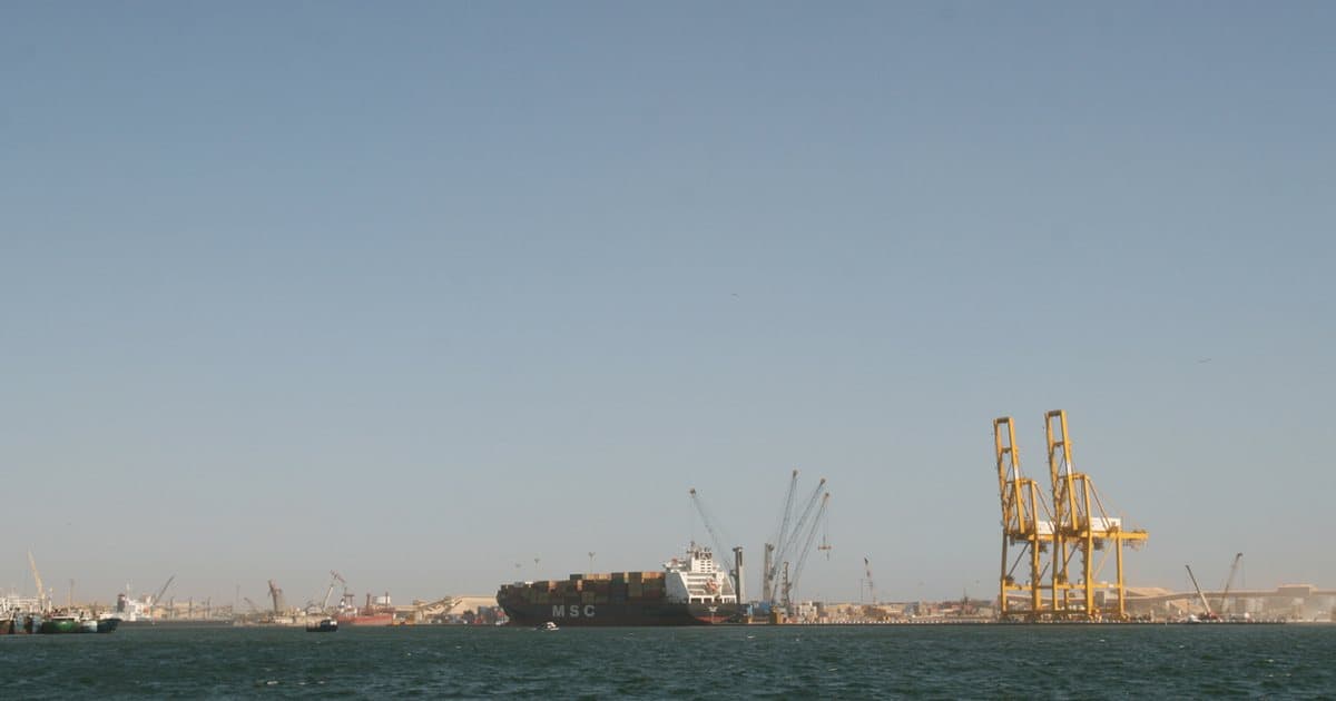 Container ship and gantry cranes at the port of Dakar