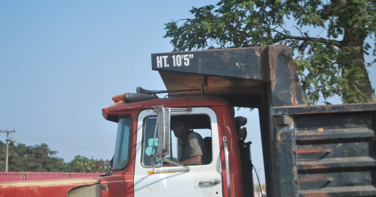 Truck cab and its driver at a stop